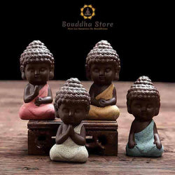 Ceramic Buddhist monk statuette